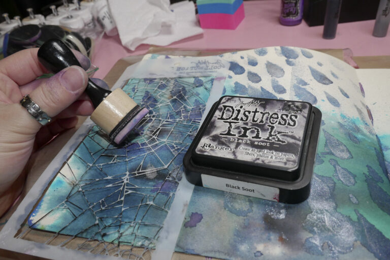 Distress tool and Distress ink black soot through Tim Holtz Shattered Stencil