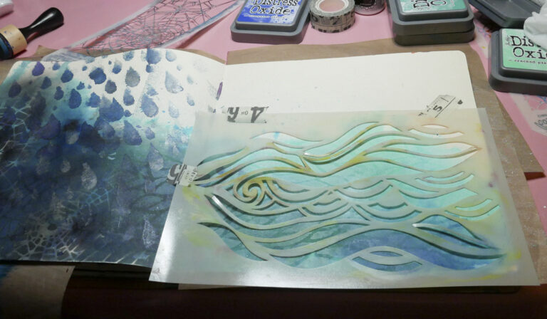 Using Dina Wakely Stencil to add waves to art journaling page