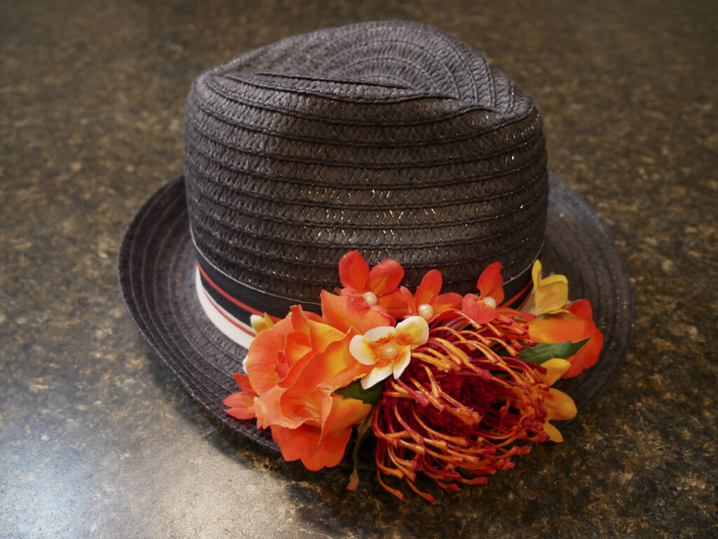 Dark Blue Hat with Orange Flowers