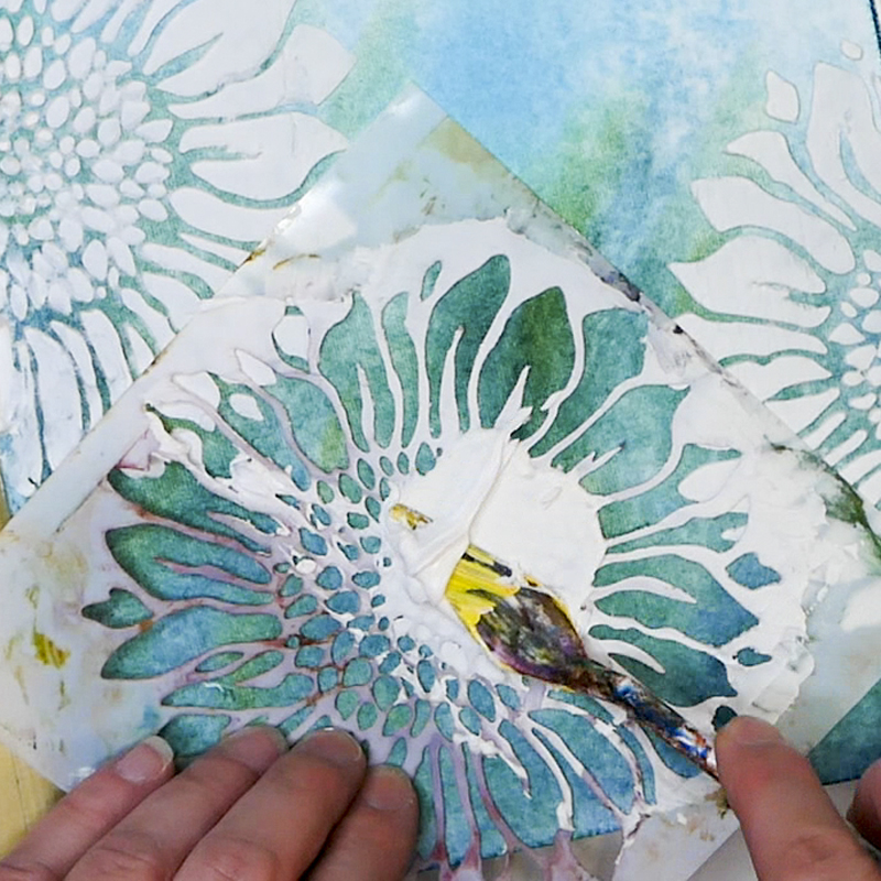 Adding Liquitex Modeling Paste through The Crafter's Workshop Joyful Sunflower Stencil