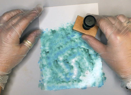 Making alcohol ink backgrounds using a felt and blending tool