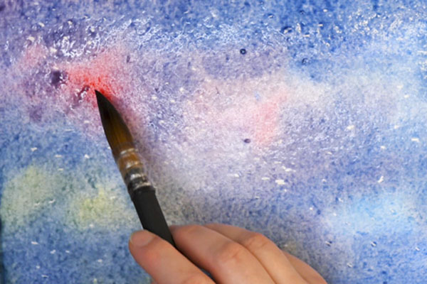 Using watercolor paint to create a night sky