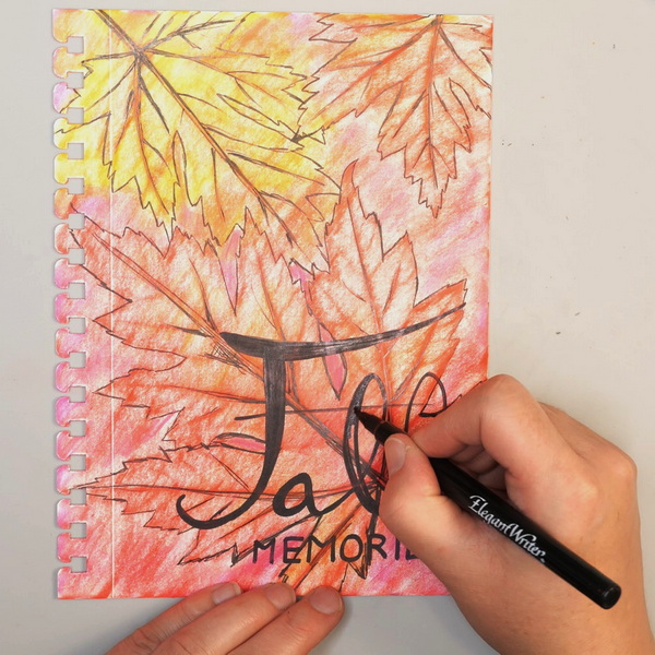 Using Elegant Writer Calligraphy Pen to add the words Fall Memories to Art Journal Page