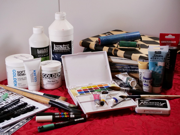 Must have mixed media supplies for the art journal including art journal, acrylic paint, gesso, matte and gel mediums, watercolor paint, acrylic and watercolor brushes, paint pens, pigment pens, stamps and stencils