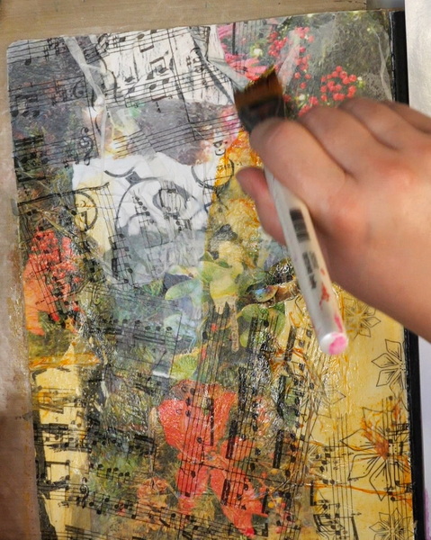 Adding Golden high flow paint washes to mixed media art journal collage