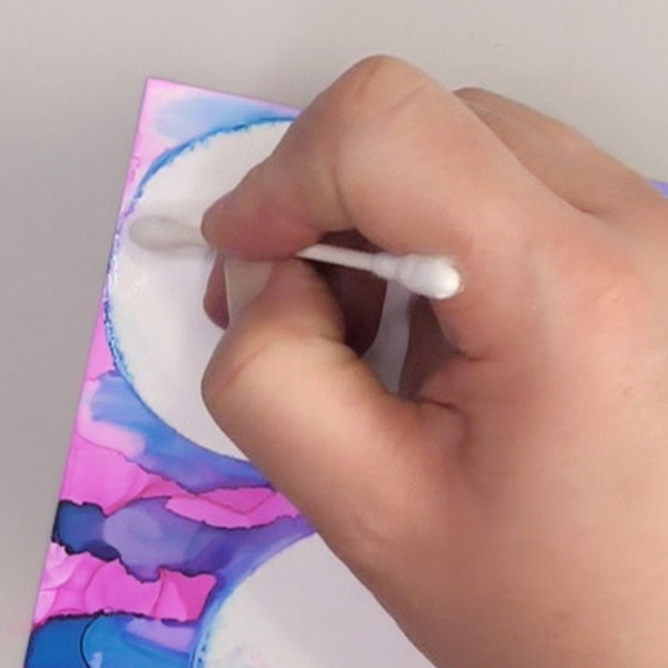 Cleaning up Edges of Alcohol Ink Resist Technique Using 99% Isopropyl Alcohol and Q-Tip