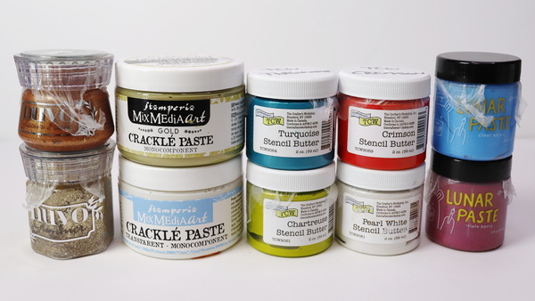 A sample of craft pastes available including Nuvo Glimmer and Glacier Paste, Stamperia Crackle Paste, TCW Stencil Butter and Ranger Lunar Paste