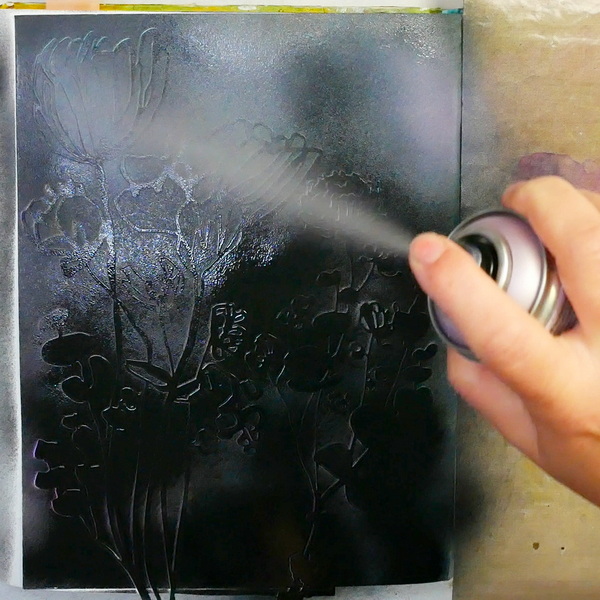 Adding Pebeo Spray Paint to Stencil Girl Wildflowers Botanical stencil in an art journal