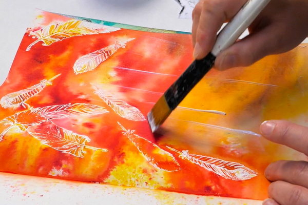 Adding soft gel medium to an art journal page to prepare for an image transfer