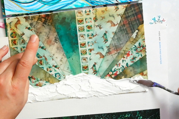 Adding Aleene's Glitter Snow to Holiday Collage using a Palette Knife to create texture to collage