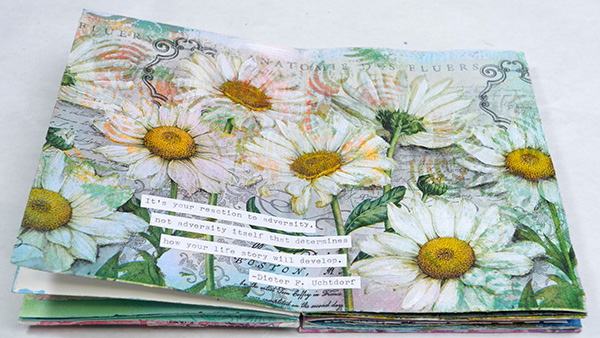 Art journal napkin decoupage using daisy napkins on acrylic paint background