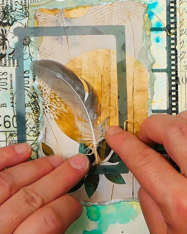 Adding feather to mixed media collage