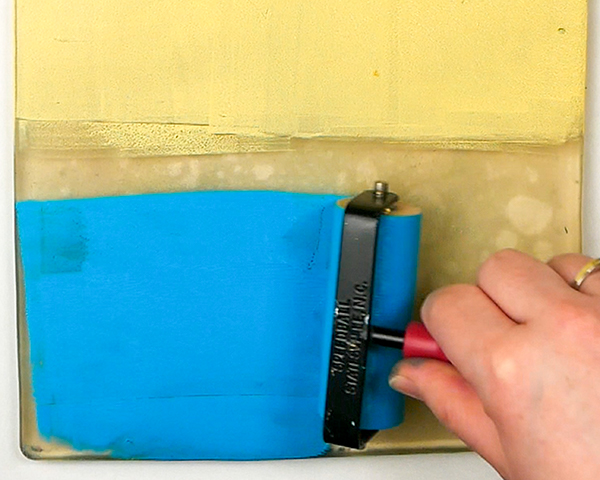 Adding acrylic paint to a gel plate to create your first gel plate print