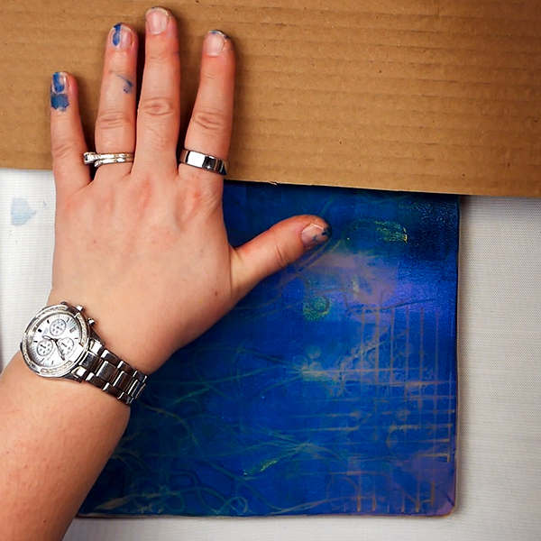Adding cardboard impressions to gel printing plate