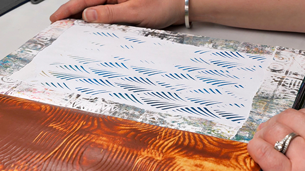 Adding a torn gelli print border to art journal page