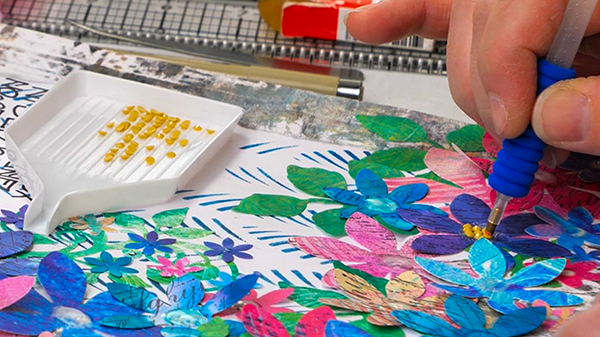 Adding diamonds to flower centers of art journal page
