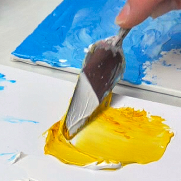 Mixing Tim Holtz Distress Ink Mustard Seed Reinker with Liquitex Modeling Paste