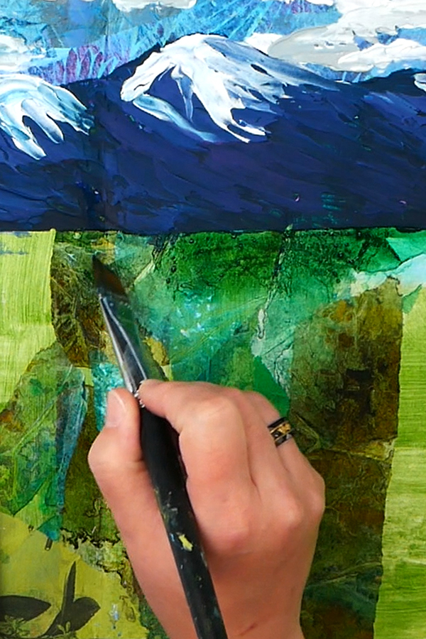 Tinting textured collage with acrylic paint
