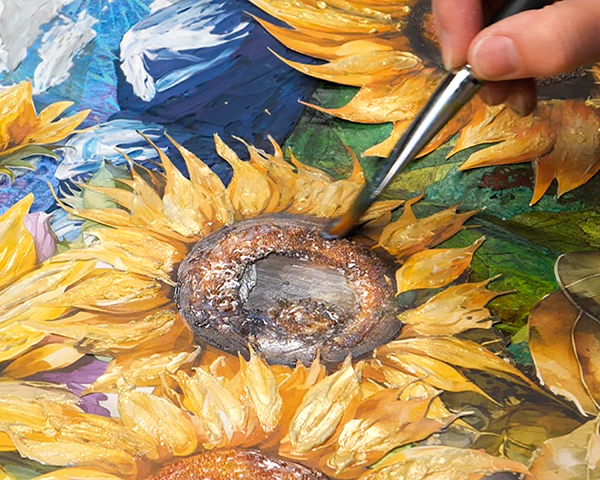 Adding gel gloss medium to sunflower centers