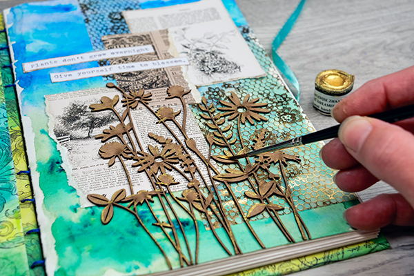 Going through a creative block? Try this mixed media art journal page to inspire your creativity