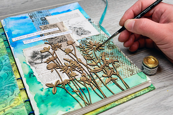 Going through a creative block? Try this mixed media art journal page to inspire your creativity