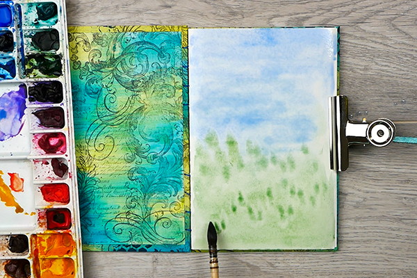 Adding cotman watercolor paints to art journal page