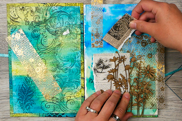 Assembling a collage on watercolor paper and vellum in an art journal