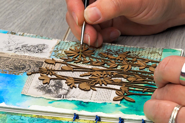 Adding Beam Paints watercolor paint to chipboard piece