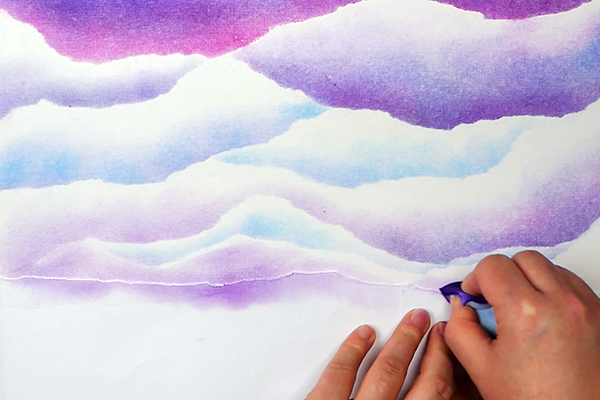 Blending Cloud Shapes using Violet Pan Pastel and makeup sponge