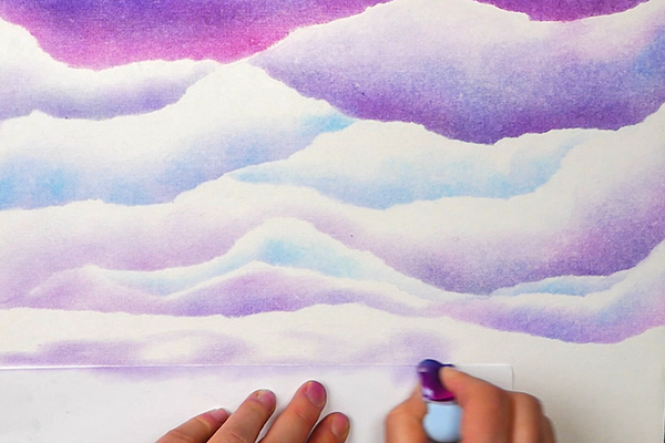 Blending Cloud Shapes using Violet Pan Pastel and makeup sponge