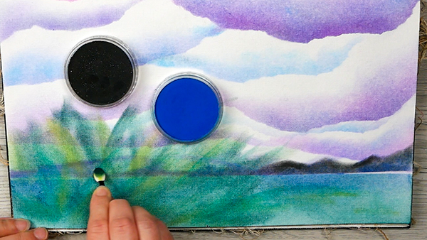 Adding a grass and bush background to cloud page in art journal using Pan Pastels