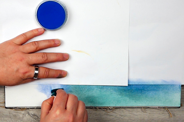 Adding a foreground to landscape area using Ultramarine Blue Pan Pastel and Phthalo Green Extra Dark Pan Pastel