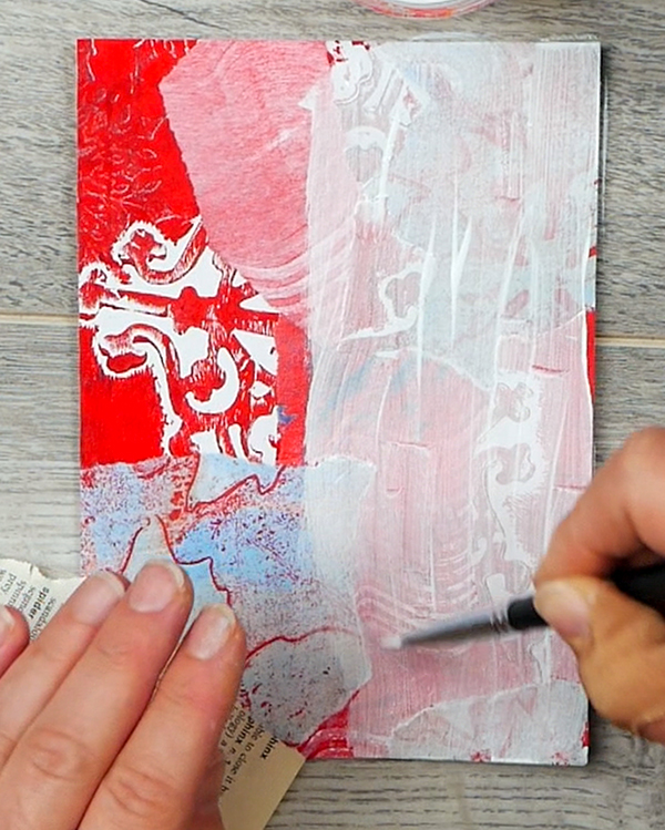 Adding acrylic paint wash on holiday collage