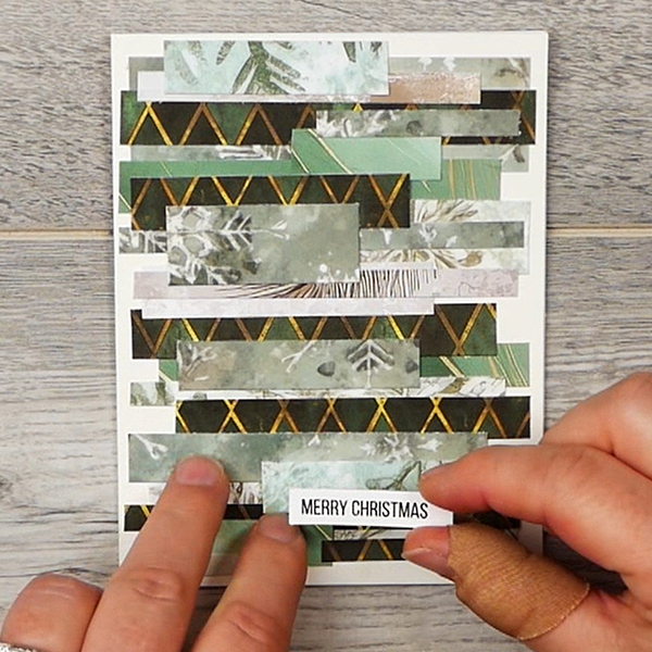 Adding a sentiment to Christmas card made with paper scraps