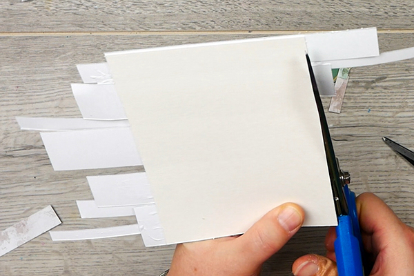 Cleaning up card edges with scissors