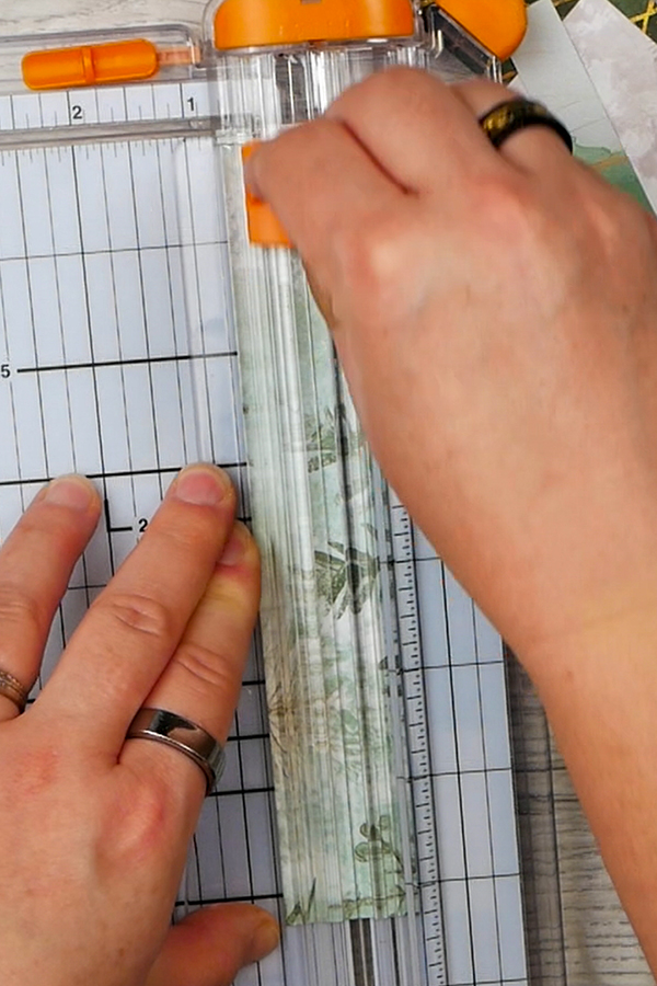 Cutting paper scraps to use on a holiday card