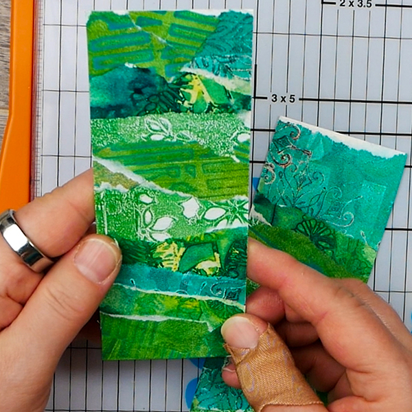 Cutting up collage paper into shapes