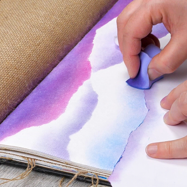 Blending Turquoise Pan Pastel to create cloud shapes