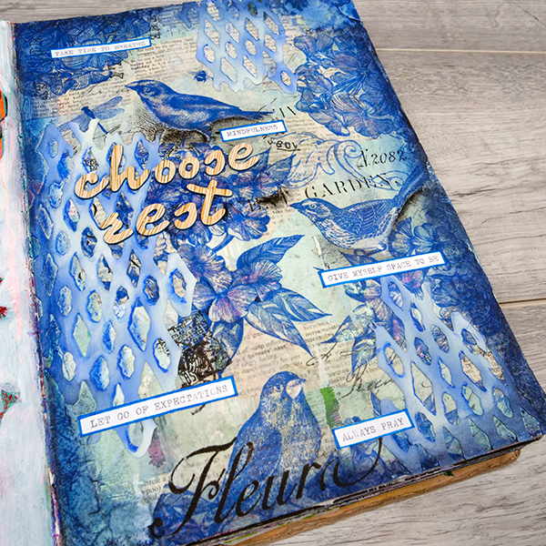 Mixed Media page altered with watercolor crayon and shadows by Nadine Milton