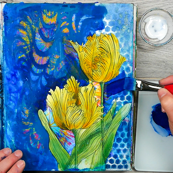 Negative painting around tulips to create harmony in a mixed media art journal page
