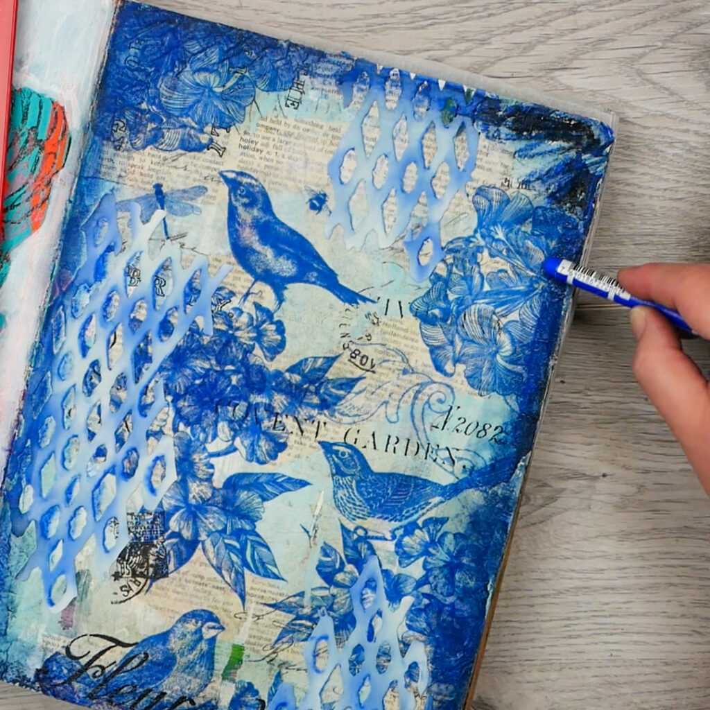 Adding in Caran d'Ache Watercolor Crayons (Neo 2) to add highlights to mixed media art journal page