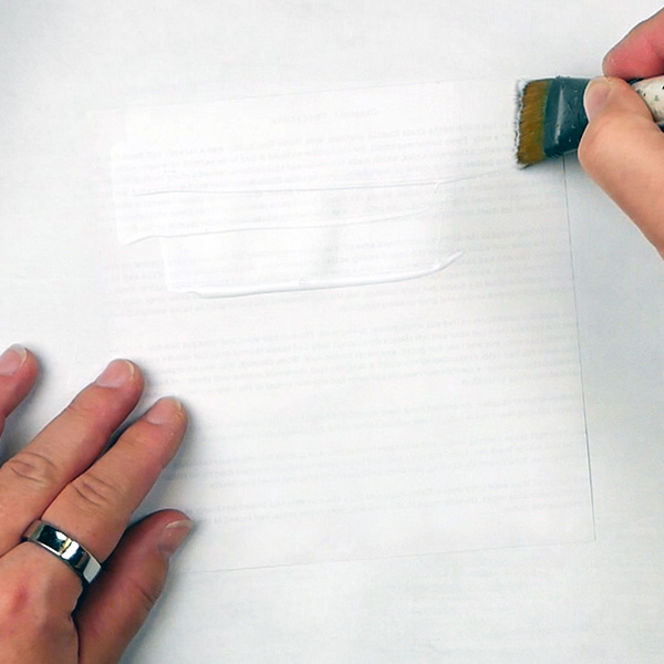 Adding Matte Medium to scrapbooking paper to create a DIY collage