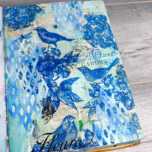 Mixed Media Art Journal Page to be altered by Nadine Milton using napkins, text paper and Seth Apter Die by Sizzix