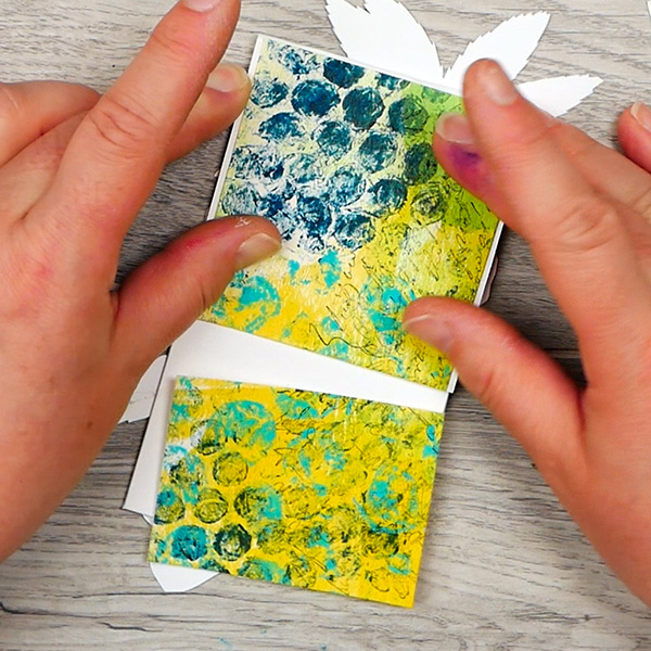 Adding handmade papers to the back of paperclip art bookmark