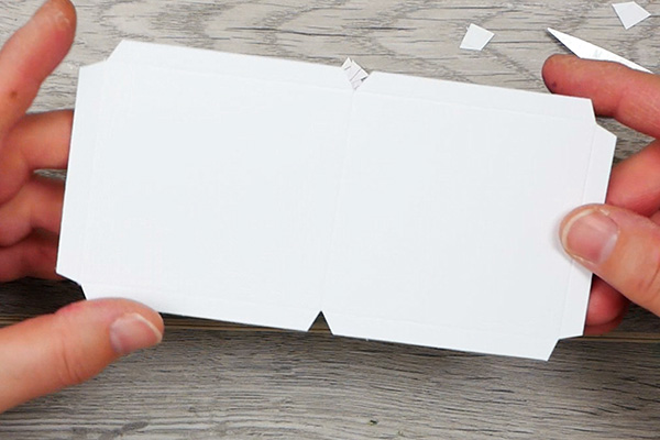 Mitered corners to fold the inside cover of an art paperclip